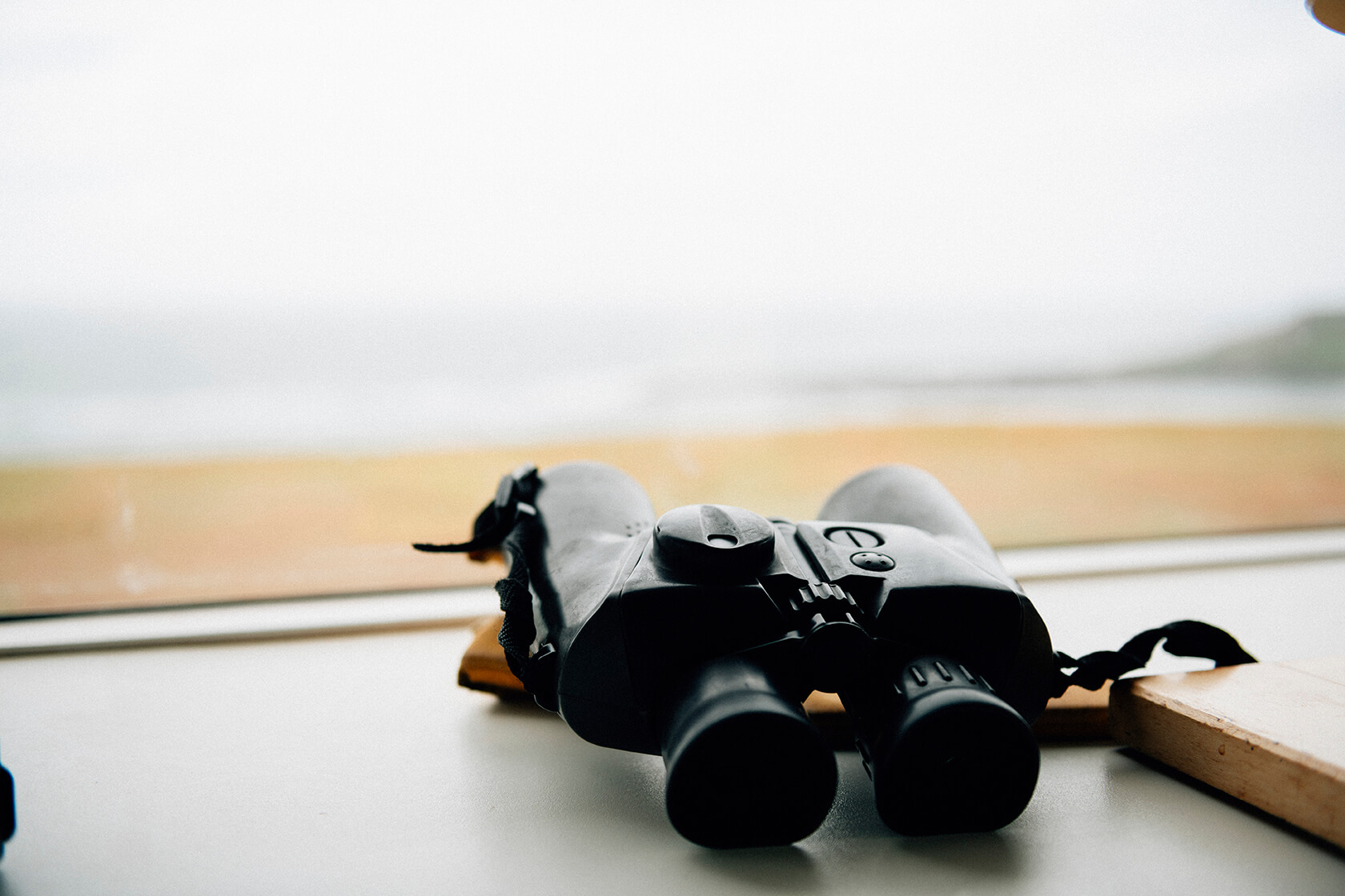 pair-of-binoculars-on-windowsill 2